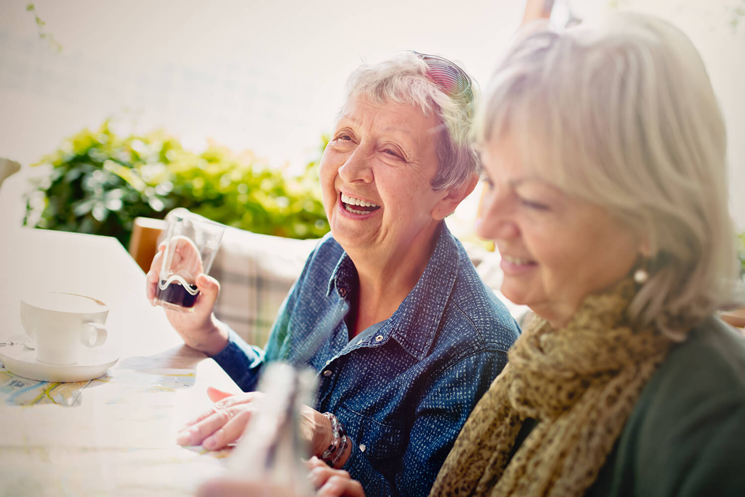 Two ladies in sidewalk cafe